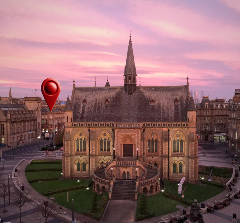 Picture of McManus Galleries and our location right behind.